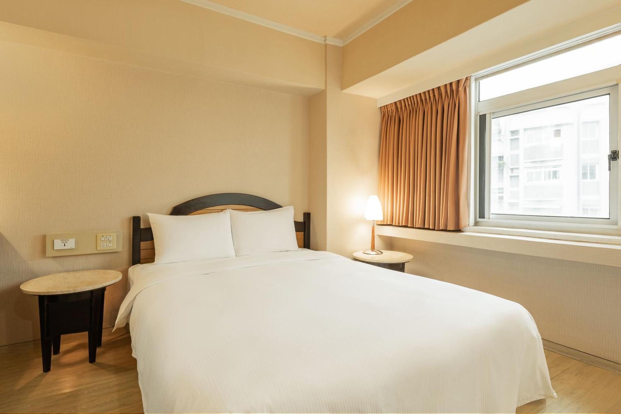 Kindness Hotel Weiwuying Kaohsiung Quarto foto