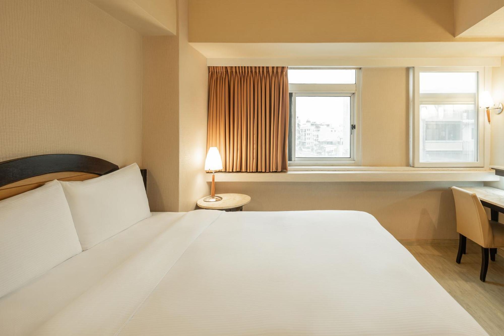 Kindness Hotel Weiwuying Kaohsiung Quarto foto