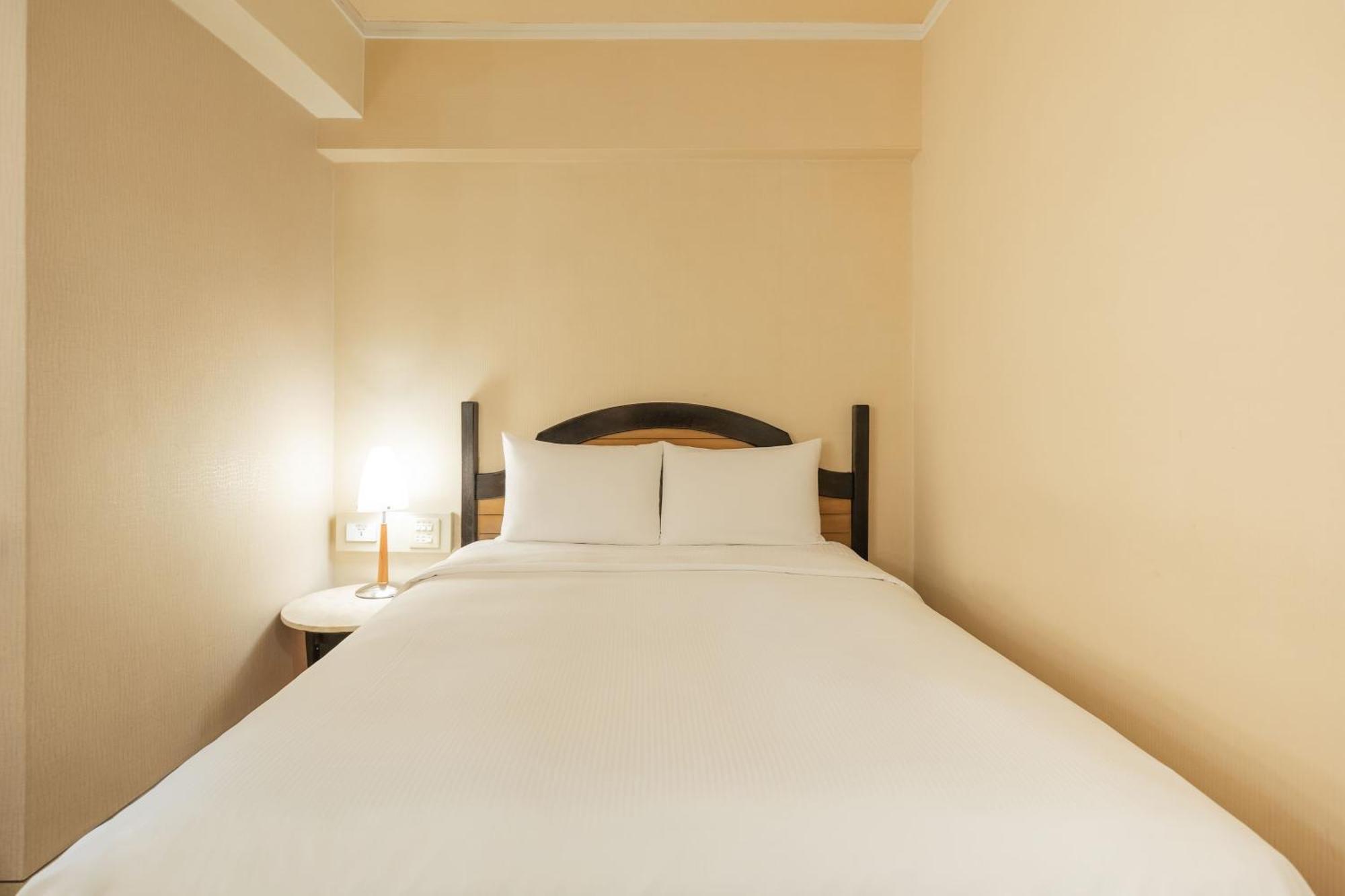 Kindness Hotel Weiwuying Kaohsiung Quarto foto