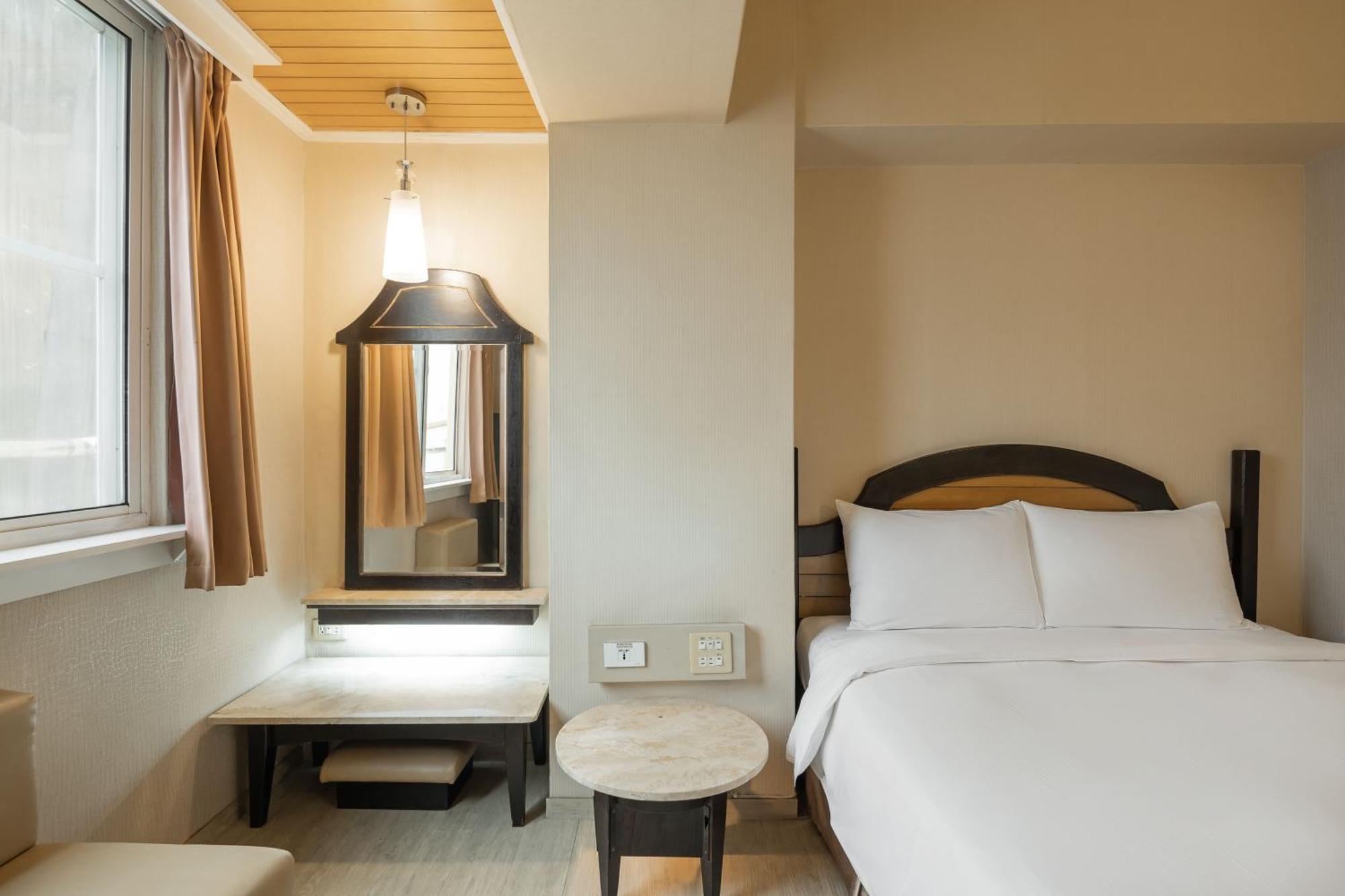 Kindness Hotel Weiwuying Kaohsiung Quarto foto