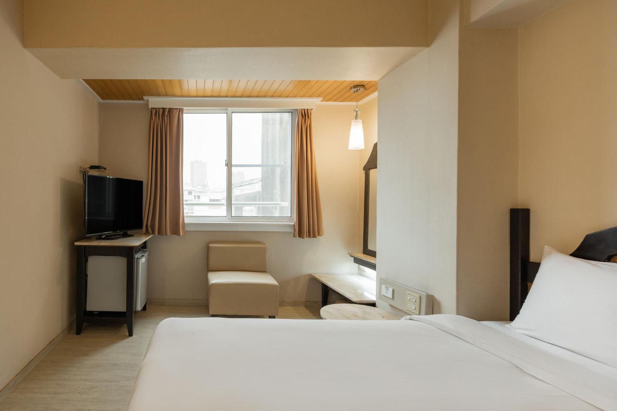 Kindness Hotel Weiwuying Kaohsiung Quarto foto