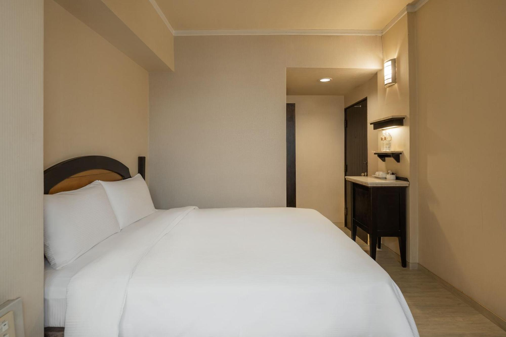 Kindness Hotel Weiwuying Kaohsiung Quarto foto
