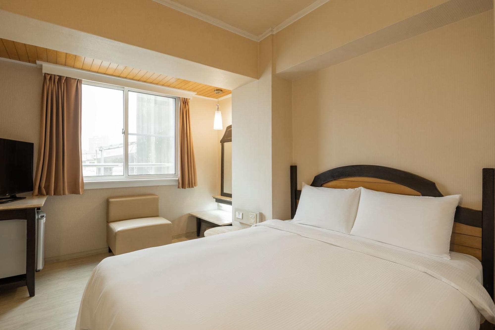 Kindness Hotel Weiwuying Kaohsiung Quarto foto